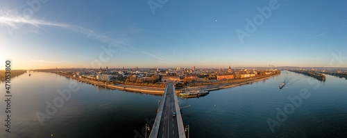 Drone panorama on the Rhine over the Theodor-Heuss bridge on the Mainz Rhine bank at sunrise