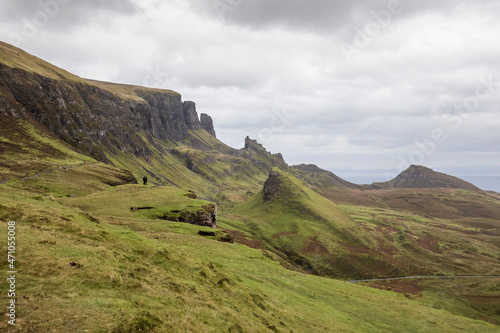 Wallpaper Mural View of two persons looking the panorama from Old man of Storr lookout on Isle of Skye, Scottish Highlands, Scotland, United Kingdom. Torontodigital.ca