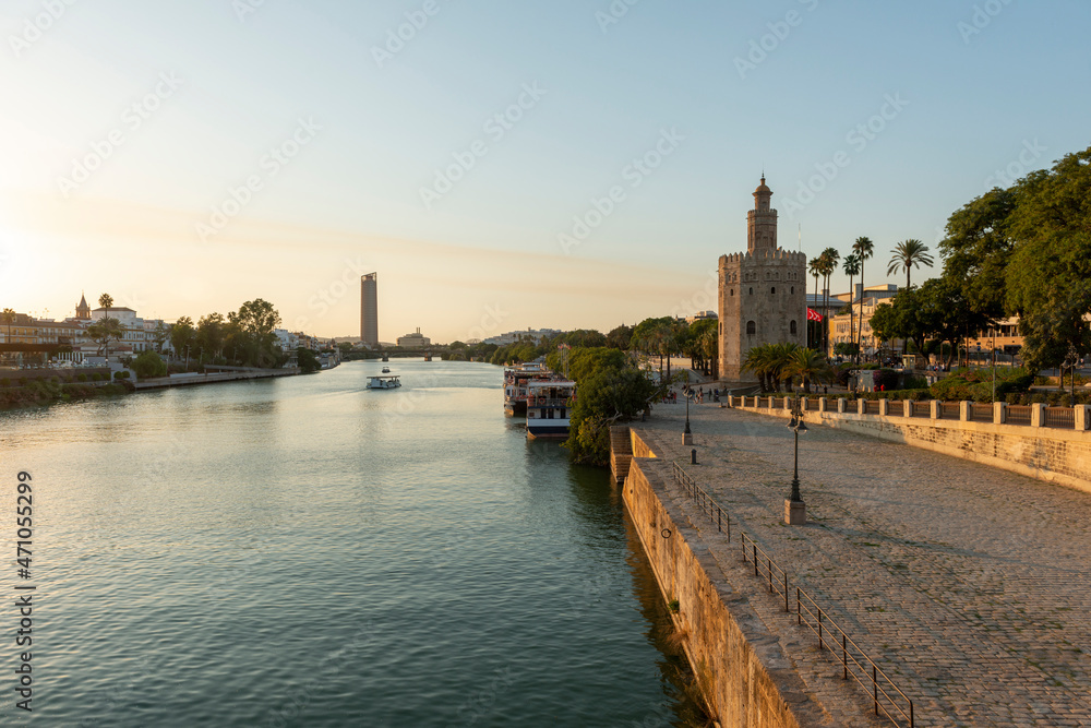 Seville, Spain - August 15, 2019: Guadalquivir River and Torre del Oro