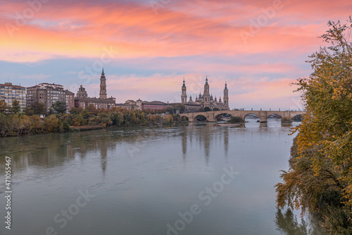 Image of Zaragoza Cathedral over the Ebro River in the morning in the sunrise
