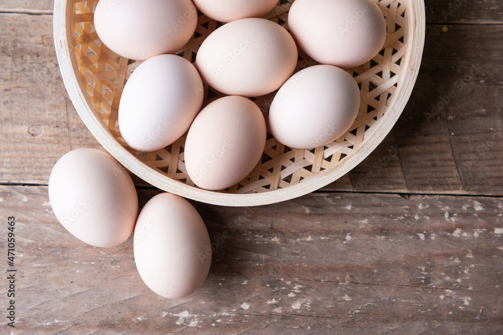 Eggs on wooden table. Brown eggs Eggs on wooden table. Brown eggs