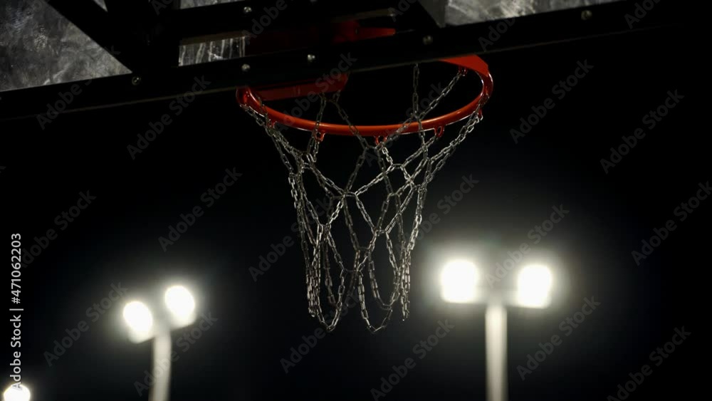 Basketball hoop. Competition for the ball at the opponent's hoop. Attempts to throw the ball into the ring. A tense moment. Athletic competitions. Basketball hoop. Competition for the ball at the opponent's hoop. Attempts to throw the ball into the ring. A tense moment. Athletic competitions.