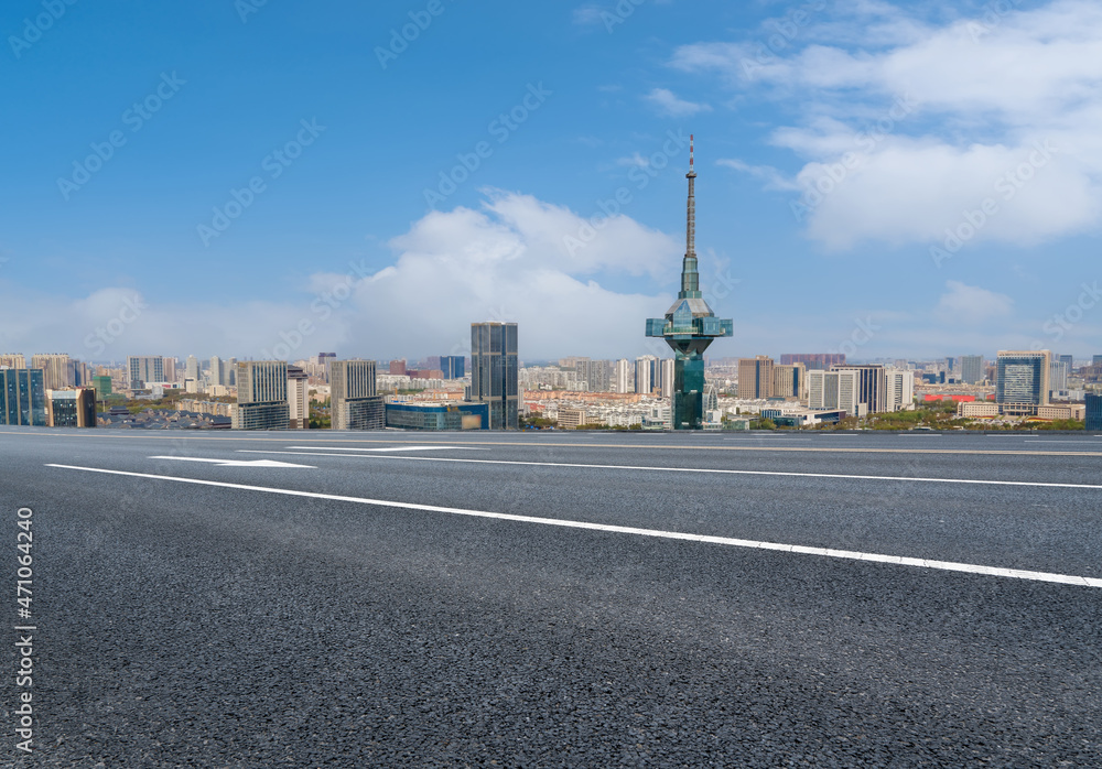 Fototapeta premium Empty asphalt road and city skyline and building landscape, China.