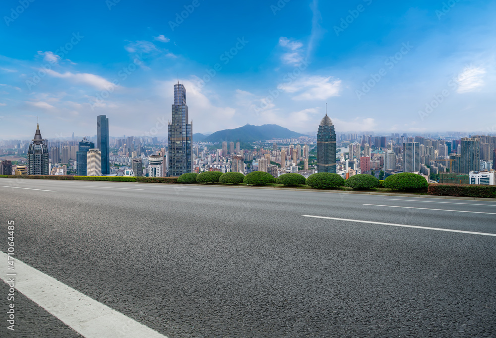 Empty asphalt road and city skyline and building landscape, China. Empty asphalt road and city skyline and building landscape, China.