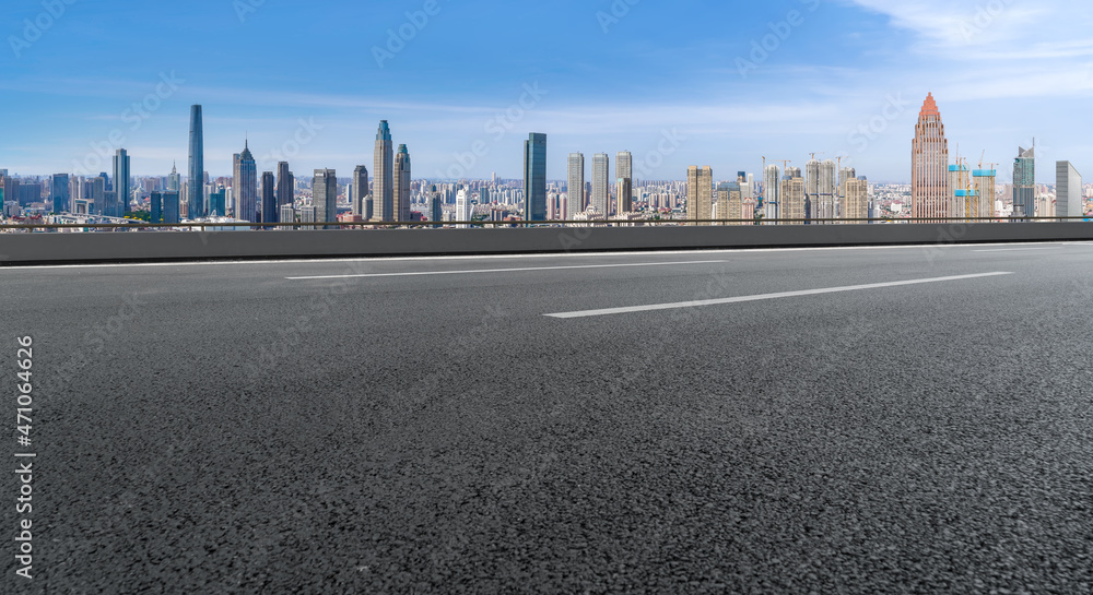 Empty asphalt road and city skyline and building landscape, China.