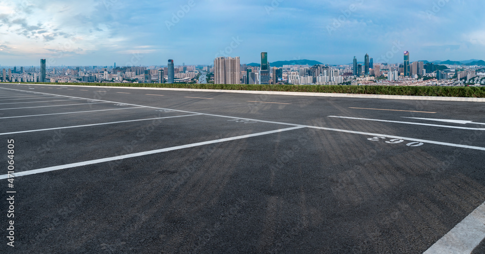 Fototapeta premium Empty asphalt road and city skyline and building landscape, China.