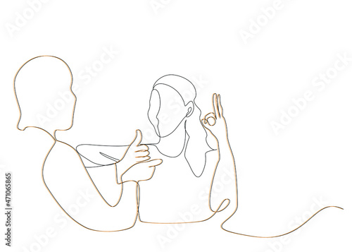 men and women trying to communicate with sign language. sign language teacher teaching