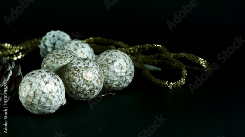 preparation of Christmas tree with its ornaments, colored balls, lights and gifts