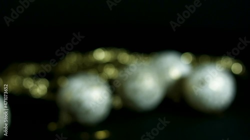 preparation of Christmas tree with its ornaments, colored balls, lights and gifts