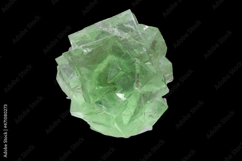 isolated green fluorite crystal mineral in black background