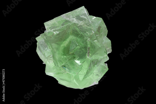 isolated green fluorite crystal mineral in black background