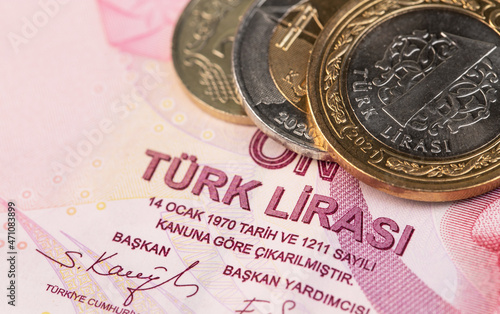 Turkish Lira banknote with liras metal coins macro closeup photo