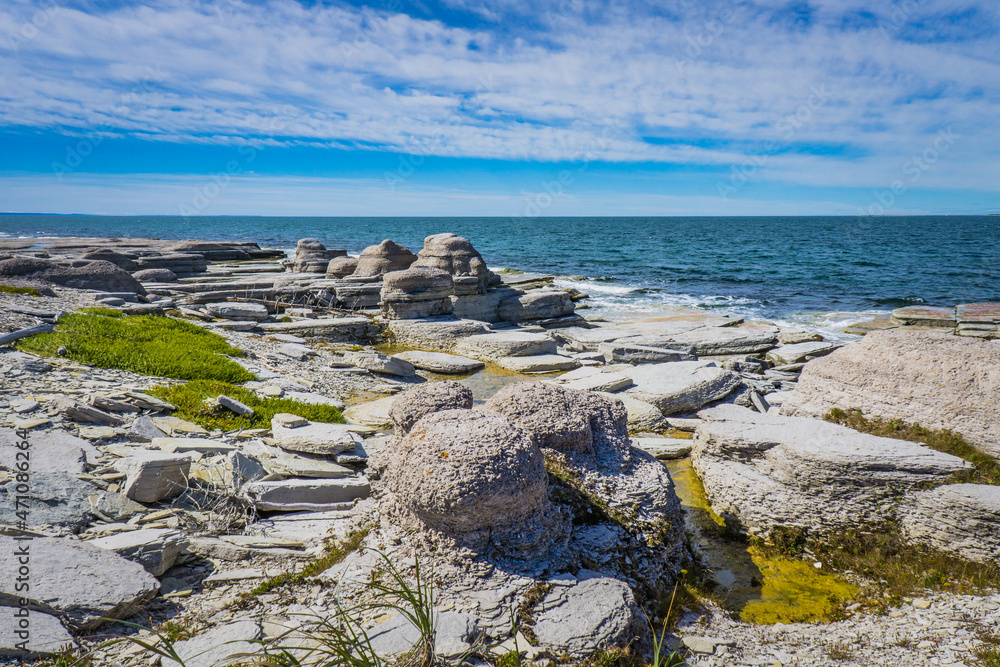 limestone outcroppings on the Nue Island, an island of the Mingan Archipelago national park in Cote Nord region of Quebec,