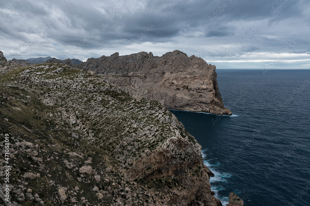 Panoramic view over the sea, cliffs, rocks and mountains of Cap de Fromentor, Mallorca, Spain