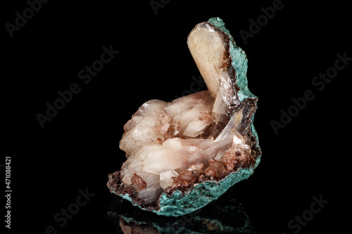 Macro of a stone Albite mineral on a black background photo