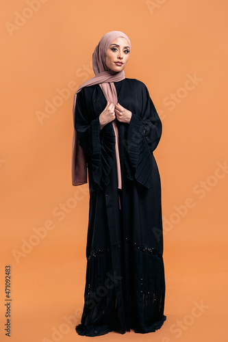 Young muslim woman looking at camera.