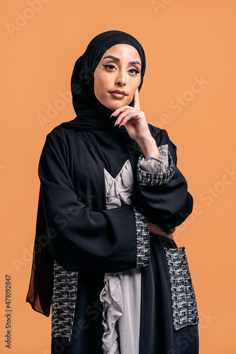 Young muslim woman looking at camera.