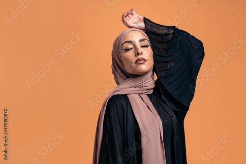 Young muslim woman in studio