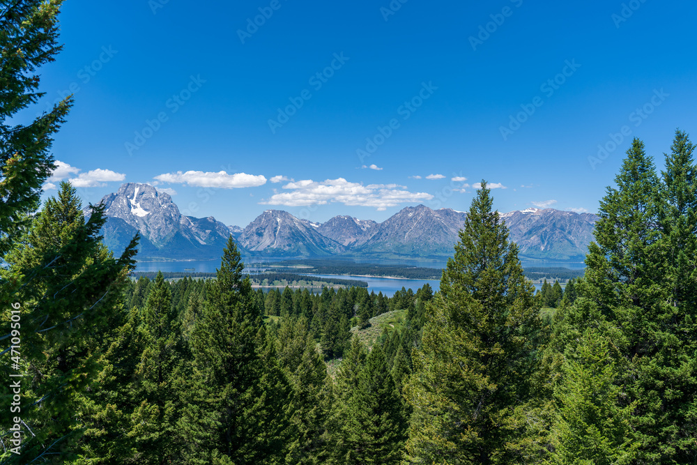The Teton mountain range rises above Jackson Lake near Grand Teton National Park near Jackson Hole, Wyoming