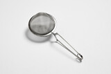 Stainless tea strainer. Still life of kitchenware.High-resolution photo.Top view.Mockup
