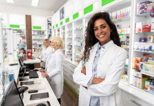 Portrait of female pharmacist in drugstore. photo