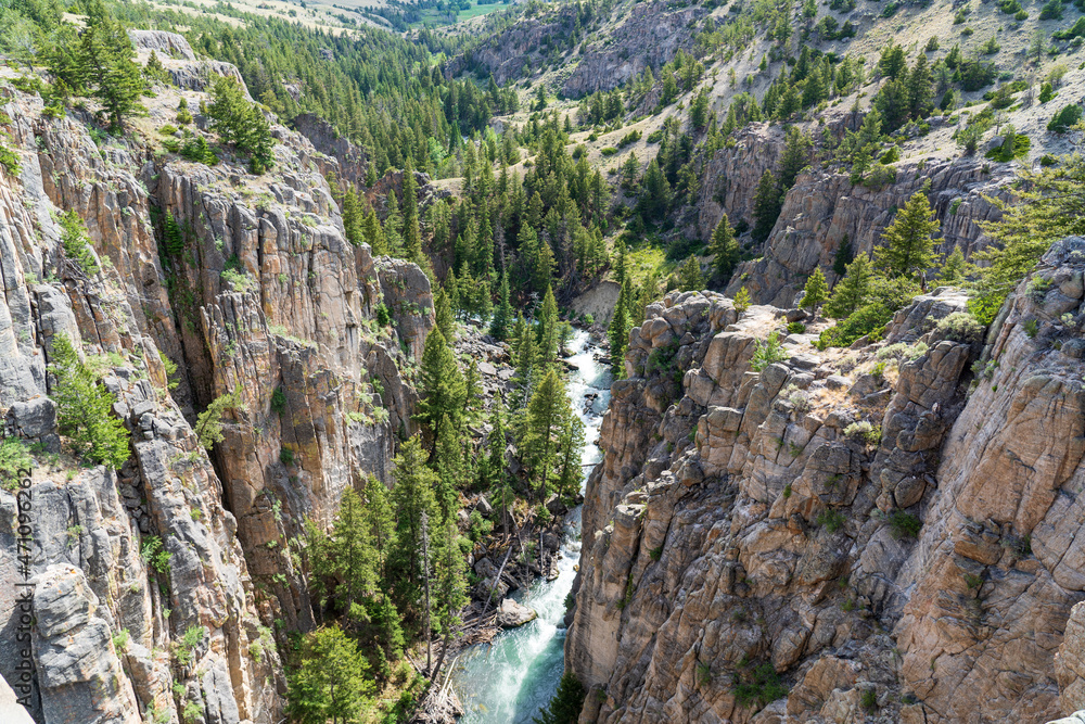 Sunlight Creek flows through the Sunlight Gorge on the Chief Joseph Highway just outside the Beartooth Mountains and Yellowstone National Park in Wyoming on a sunny summer afternoon Sunlight Creek flows through the Sunlight Gorge on the Chief Joseph Highway just outside the Beartooth Mountains and Yellowstone National Park in Wyoming on a sunny summer afternoon
