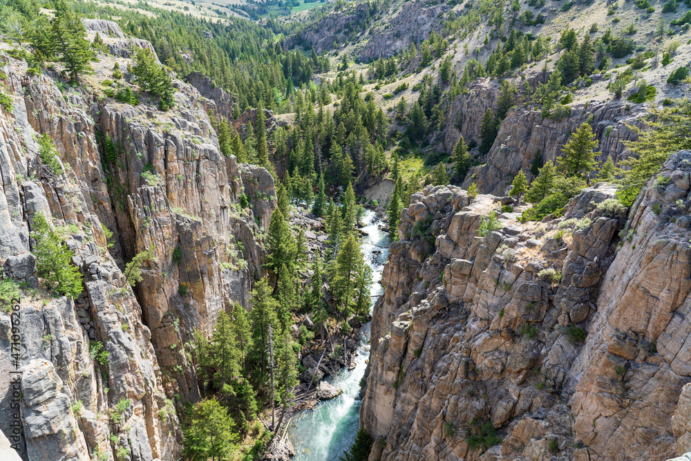 Sunlight Creek flows through the Sunlight Gorge on the Chief Joseph Highway just outside the Beartooth Mountains and Yellowstone National Park in Wyoming on a sunny summer afternoon