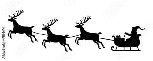 Silhouette Santa flying on deer sleigh