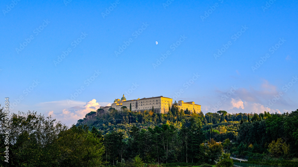 View of the Abbey of MonteCassino, Latium, Italy. Abbey at sunset with moon and blue sky