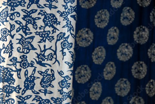 Wuzhen Water Town, Zhejiang Province, China. Indigo blue and white printed calico - a traditional cotton fabric produced in Wuzhen and a souvenir purchase for tourists. photo