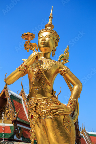 Giant statues are carrying pagoda Thailand 