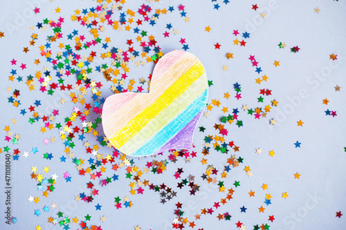 milticolored sequins and lgtb flag in the form of a heart. concept of a lgbt holiday photo