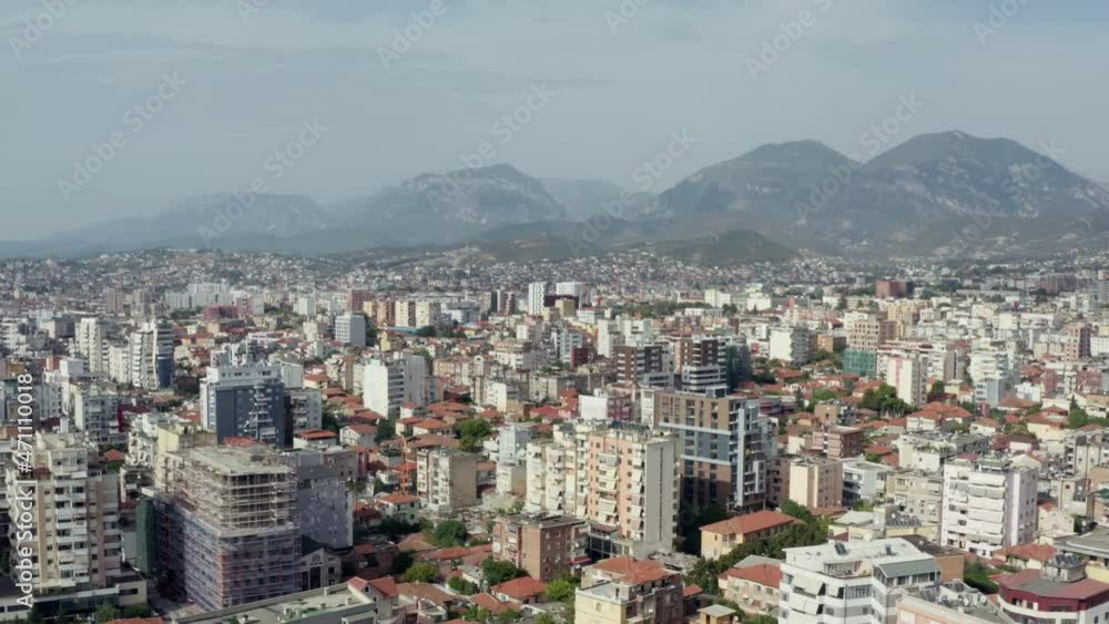Aerial view Tirana Albania. Cityscape with a background of mountains in the Balkans, sleeping areas with skyscraper houses. Aerial view Tirana Albania. Cityscape with a background of mountains in the Balkans, sleeping areas with skyscraper houses.