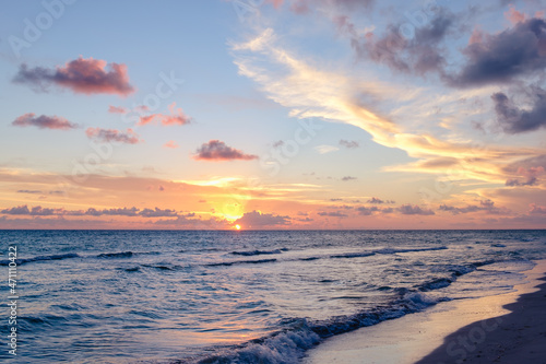 Beautiful colored cloudy evening sky.  Seascape.