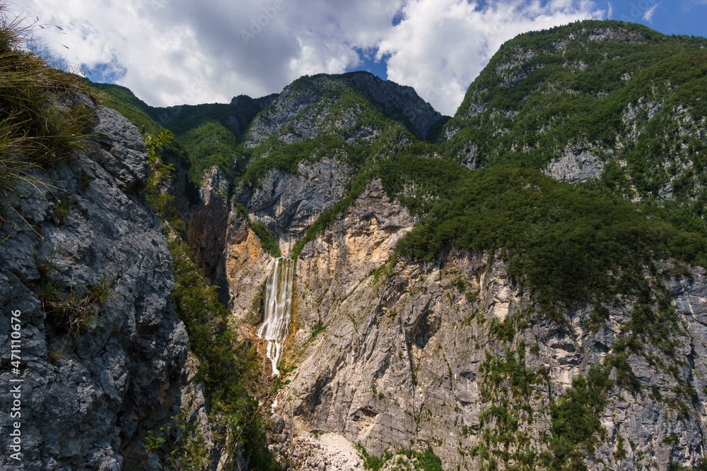 Famous waterfall slap Boka on sunny summer day in Julian Alps in Triglav National park, Slovenia