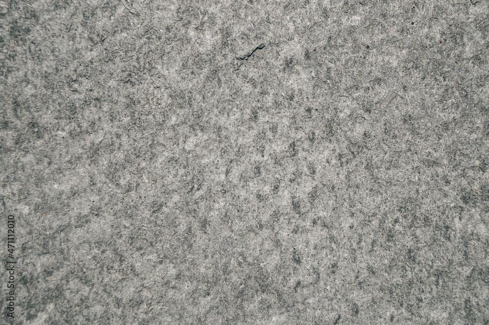 Close-up of a gray asbestos slab. Building material. Close-up of a gray asbestos slab. Building material.