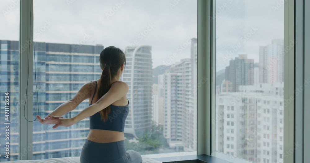 Woman do stretching exercise at home Woman do stretching exercise at home