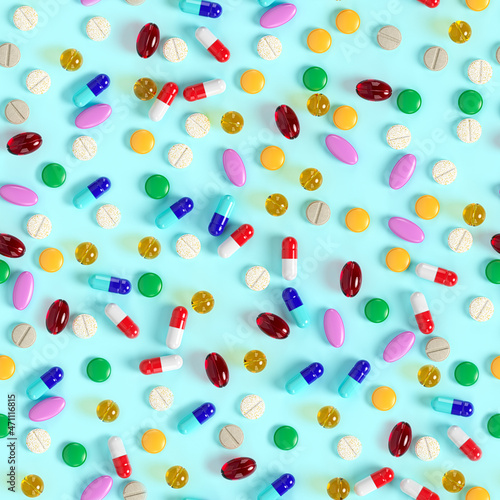 Seamless pattern of multicolored tablets and pills on a blue surface. Variety of vitamins. Production of drugs. Medical theme. 3d rendering. 