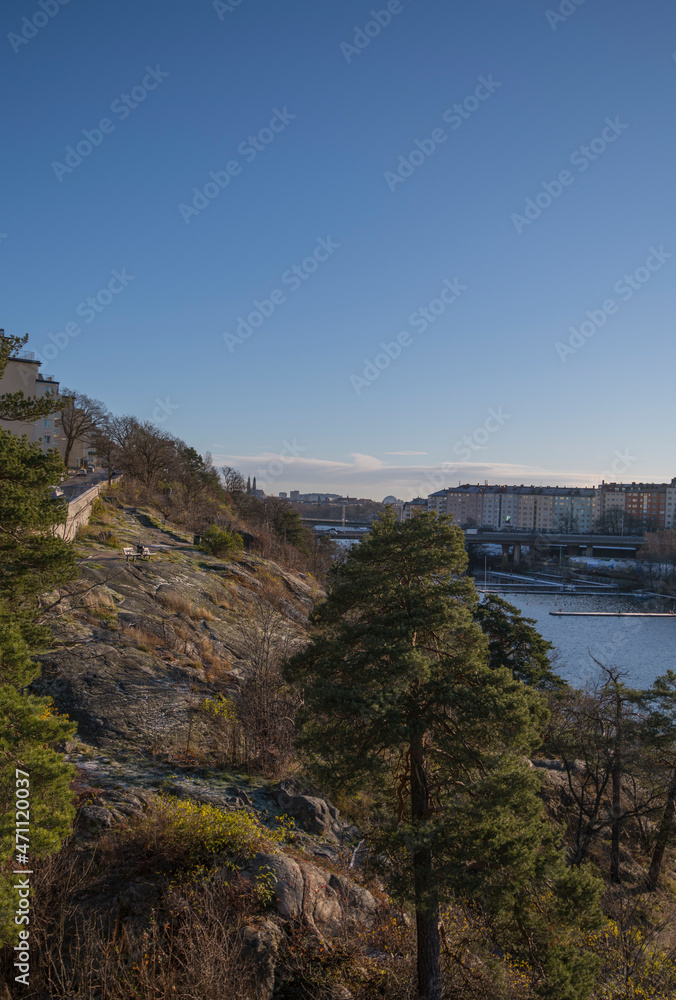 Cliff water front view in the district Marieberg a sunny color full autumn day in Stockholm