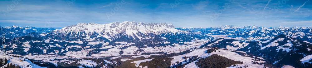 Beautiful alpine panoramic view snow capped mountains, European beautiful winter mountains in Alps, Slope for cross country skiers in landscape
