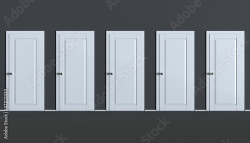 Black wall with five closed white doors. Different ways concept.
