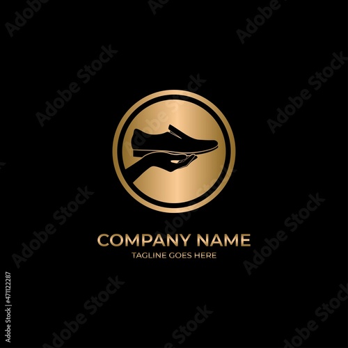 Logo design with hand holding shoes concept, logo vector template.