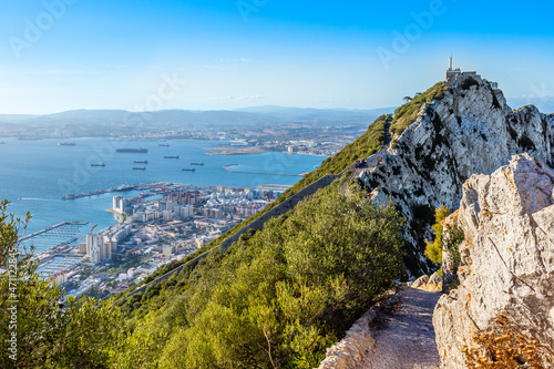 Steep road on the top of Rock of Gibraltar with the city and bay panorama