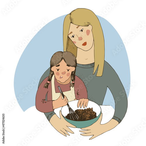 Mother and daughter cooking in kitchen