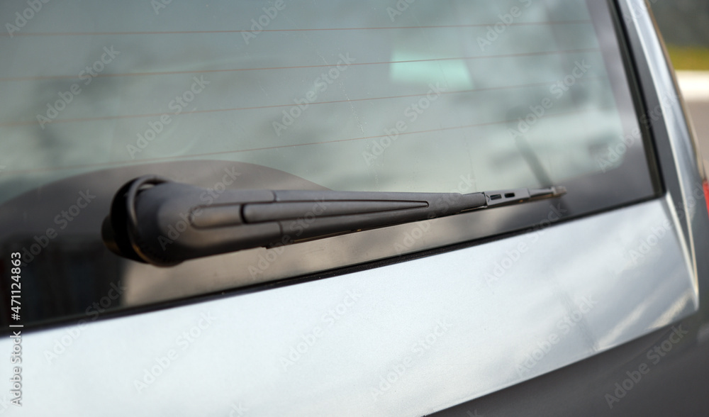Close up of back windshield wiper of the modern car Close up of back windshield wiper of the modern car