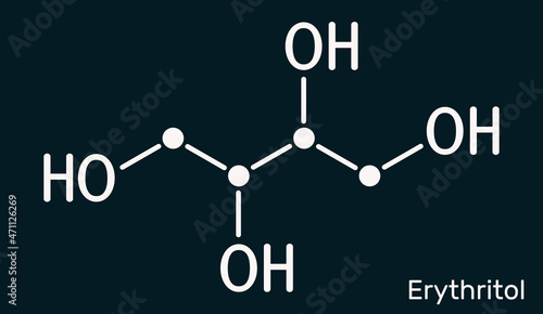 Erythritol molecule. It is sugar alcohol or polyol, food additive, sugar substitute, E968, Is found in algae, fungi, lichens. Skeletal chemical formula on the dark blue background photo