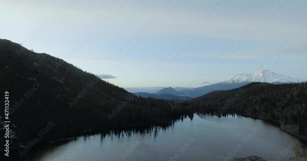 Drone flies over Castle Lake, Mount Shasta in the background, aerial view, Shasta-Trinity National Forest, California, USA Drone flies over Castle Lake, Mount Shasta in the background, aerial view, Shasta-Trinity National Forest, California, USA