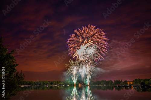 Fireworks display over the lake in L'Isle-Jourdain, France