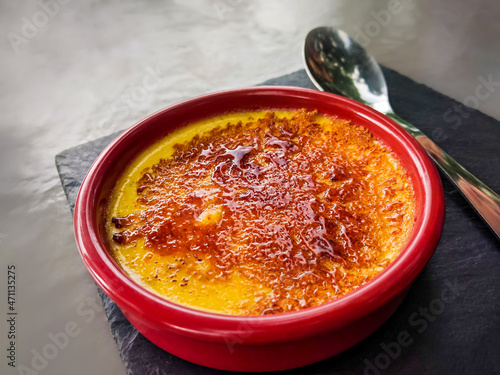 Creme Brulee dessert in France. Depth of field, blur background photo