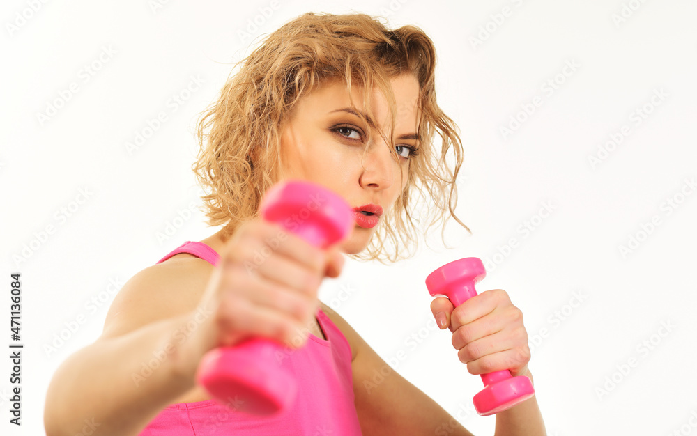 Sports woman with dumbbells. Healthy lifestyle and strength training. Confident woman Workout at home. Sports woman with dumbbells. Healthy lifestyle and strength training. Confident woman Workout at home.